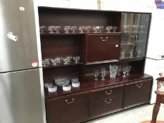 A mahogany effect display cabinet