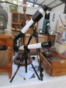 2 telescopes with tripod stands,