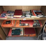 A collection of stamp related books including some abums