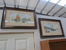 A pair of framed and glazed seascape prints