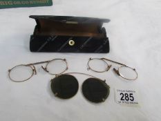 2 pairs of vintage pince nez and a pair of clip on sunglasses