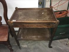 A wooden tea trolley