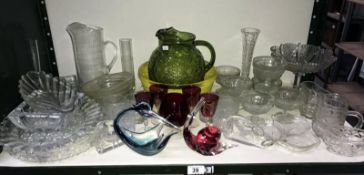 A shelf of glassware,