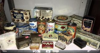 A quantity of vintage tins