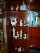 A mixed lot of bisque figures, pottery figures,