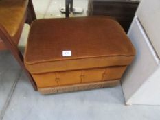 A dralon covered footstool storage box
