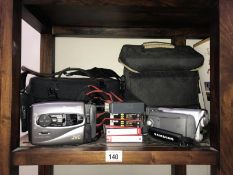 A Samsung & JVC camcorders with cases