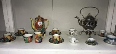 A coffee set featuring abstract pattern including 4 cups/saucers, coffee pot,