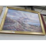 A gilt framed country scene