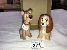 A Disney 'Lady and the Tramp' salt and pepper pots (Tramps ear is a/f)