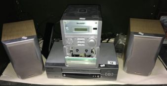 A Sharp CD/Tape system and Pacific VHS recorder