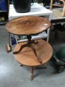 A pie crust three legged table and a round coffee table