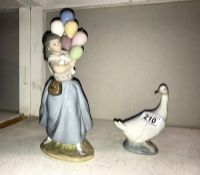 A Lladro figure of a girl with balloons & Nao figure of a goose