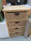 A pine and basket ware 4 drawer chest