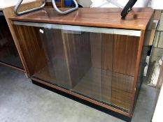 A glass fronted cabinet