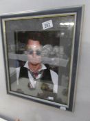 A framed and glazed signed photograph of Johnny Depp