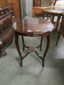 A Victorian mahogany occasional table.