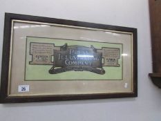 A framed and glazed advertisement