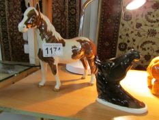 A Beswick horse and Arab horse head