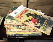 A collection of early Western Story books including Street and Smiths Western Story July 1947
