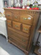 A 4 drawer chest by Tennessee Furniture Industries