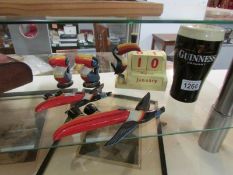 6 items of Guinness advertising ceramics including wall toucans, money box,
