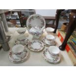 A 16 piece Wedgwood Hathaway Rose tea set comprising tea pot, milk jug, sugar bowl, sandwich plate,