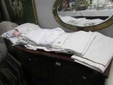 A large quantity of vintage textiles and household linens