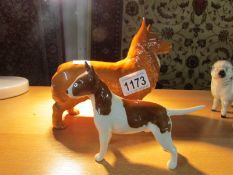 A Beswick Staffordshire Bull Terrier and a Beswick Corgi.