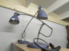 A pair of modern reading lamps