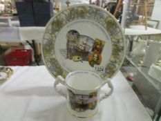 An Aynsley Millenium loving cup and plate
