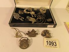 A mixed lot of vintage silver jewellery including earrings, brooches, rings, some with cat motif's,