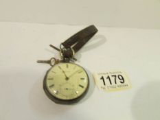 A silver pocket watch, springs ok, glass cracked.