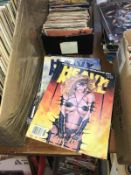 A collection of Heavy Metal magazines