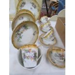 A part china tea set marked 'Victoria Austria'