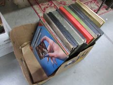 A box of mainly classical LP records