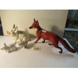 3 Beswick pigs and a Beswick fox