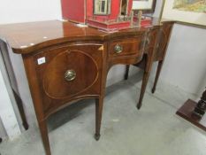 A Georgian mahogany inlaid sideboard.