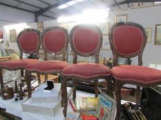 A set of 4 mahogany balloon back chairs