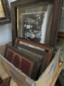 A box of pictures and picture frames