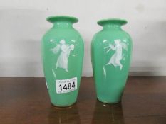 A pair of Victorian 'overlaid' green glass vases.