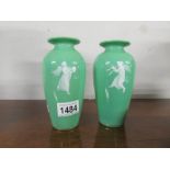 A pair of Victorian 'overlaid' green glass vases.