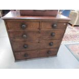 An oak 2 over 3 chest of drawers