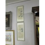 A pair of signed oriental framed and glazed bird/flower panels,