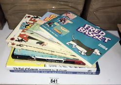 A collection of graphic novels and comic books