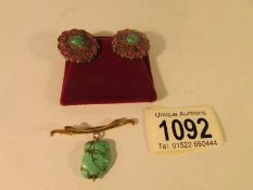 A pair of foiled back ruby and turquoise earrings and a 15ct gold brooch set turquoise