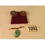 A pair of foiled back ruby and turquoise earrings and a 15ct gold brooch set turquoise