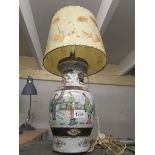 An oriental table lamp with shade