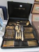 A cased Solingen Besteck gold plated canteen of cutlery (some pieces show signs of wear)