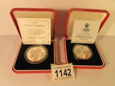 A 1947 - 1997 silver proof £5 mint coin and a 996 commemorative silver proof coin,